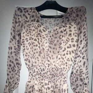 Cheetah patterned ruffled dress.